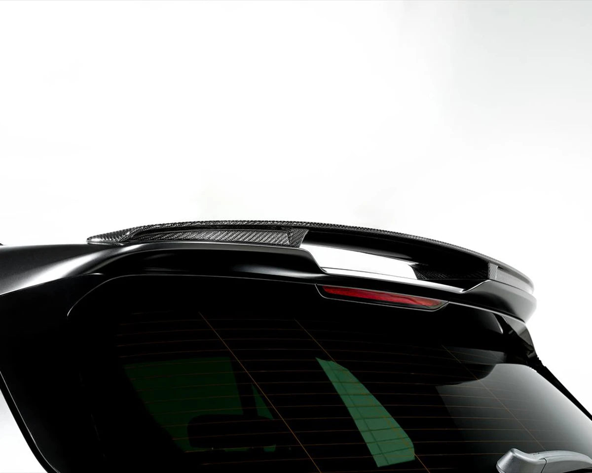 Side angle showing 3DDesign carbon roof spoiler on the X5M