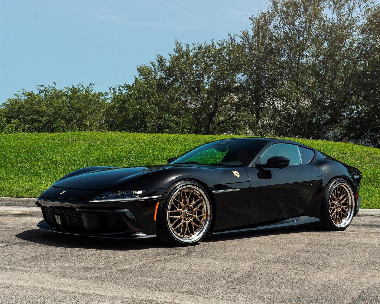 Front three-quarter view of Ferrari 12Cilindri lowered with Novitec springs on ANRKY RS1 Classic wheels