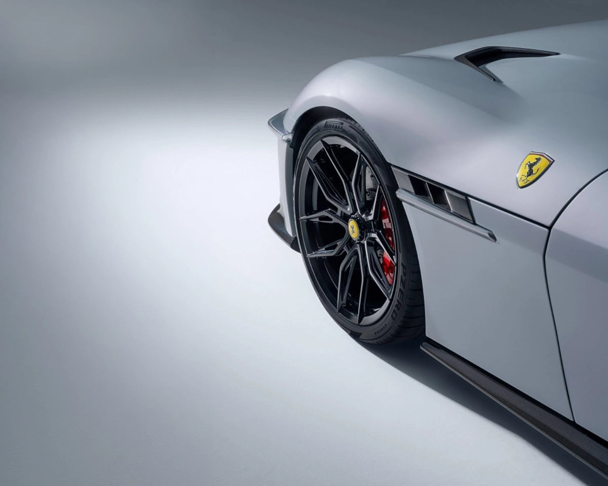 Close-up of the NOVITEC Ferrari 12Cilindri forged front wheel with carbon fibre aerodynamic details