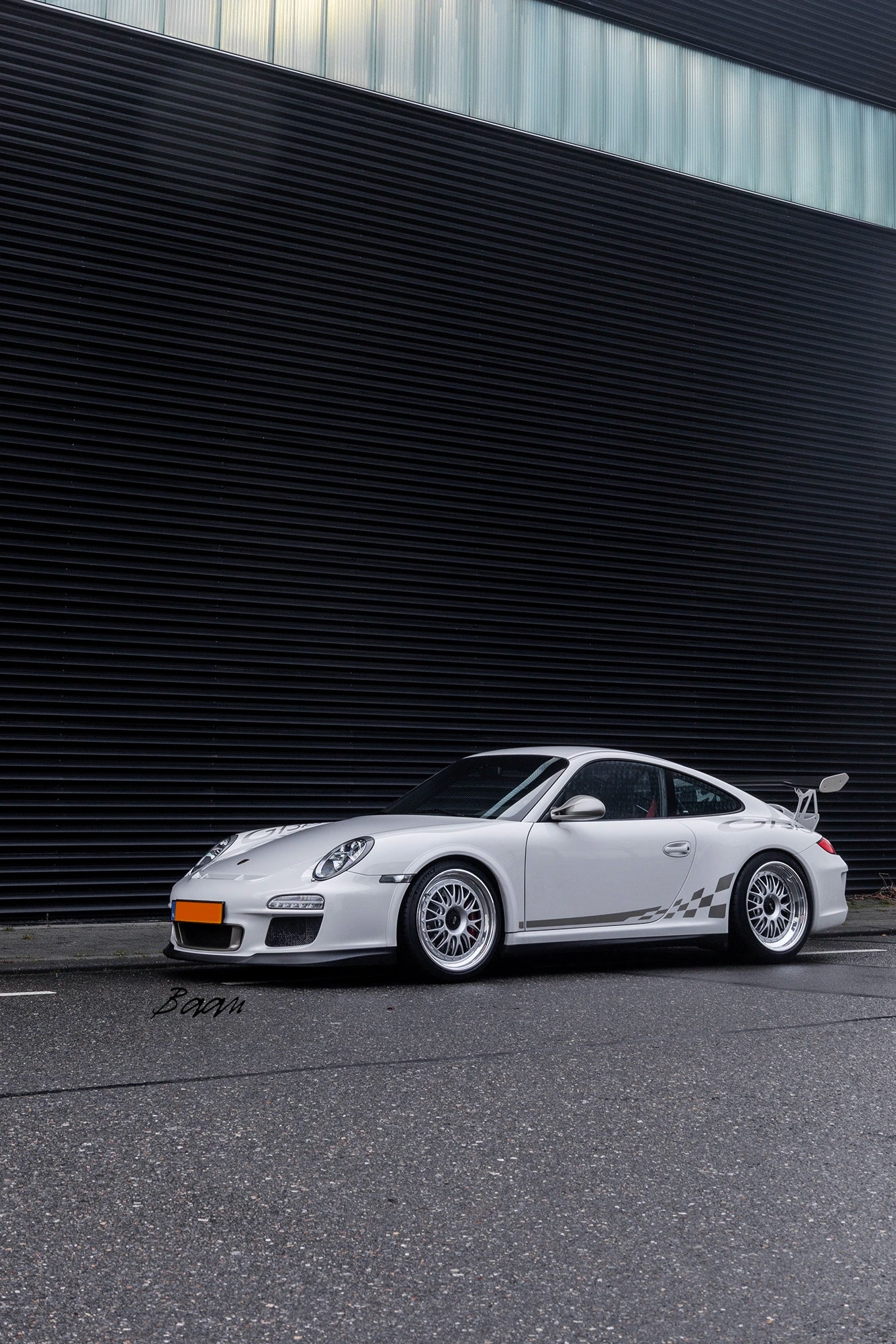 Close-up of BBS E88 9.5x19 ET41 front wheel on Porsche 997.2 GT3 RS showing silver centre and 1.5-inch lip.