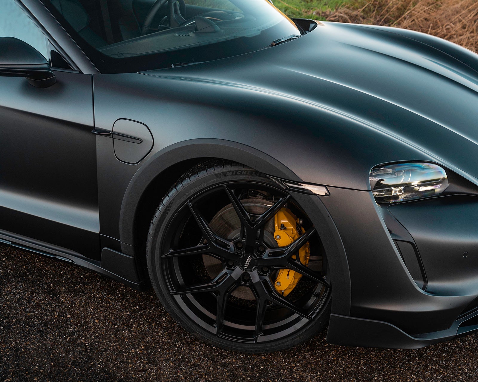 Porsche Taycan sport turismo with 22 inch wheels, Vossen HF5 in satin black