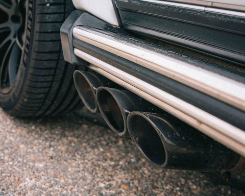 IPE black chrome tailpipes installed on a  Mercedes G63 AMG W463