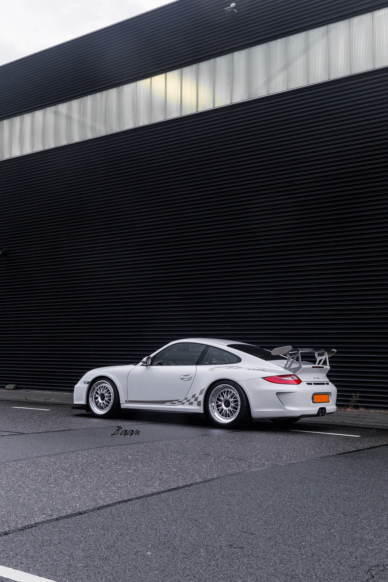 Side profile of Porsche 997.2 GT3 RS showing BBS E88 forged wheels and perfect motorsport stance.