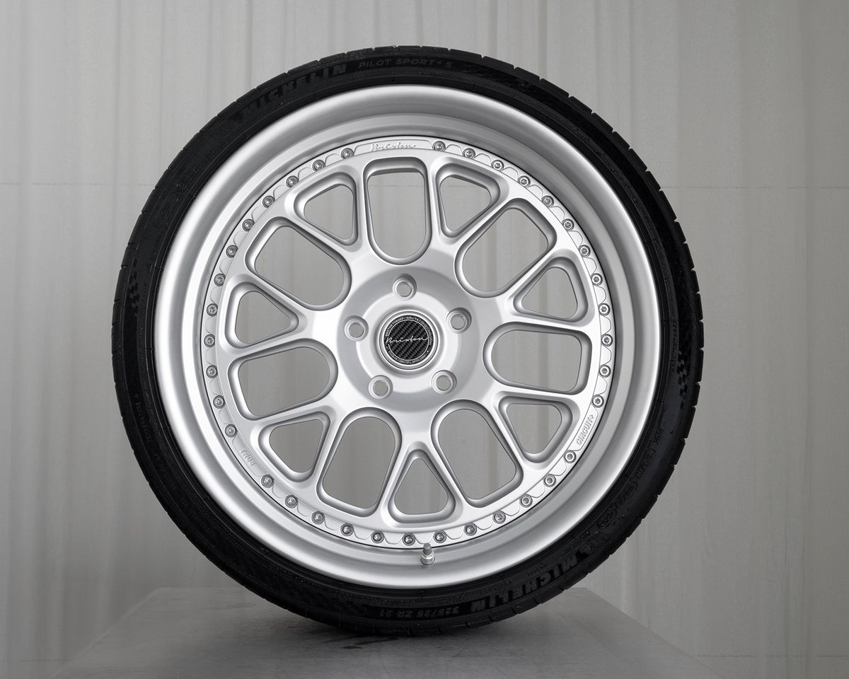 Front view of Brixton Forged TR08 Circuit+ silver wheels with Michelin tires for Porsche 991