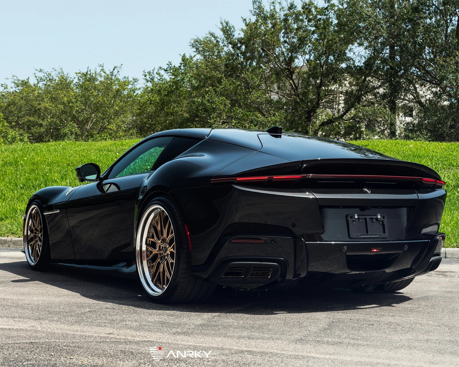 Rear view of Ferrari 12Cilindri with Novitec lowering springs and staggered ANRKY RETROSeries RS1 Classic wheels