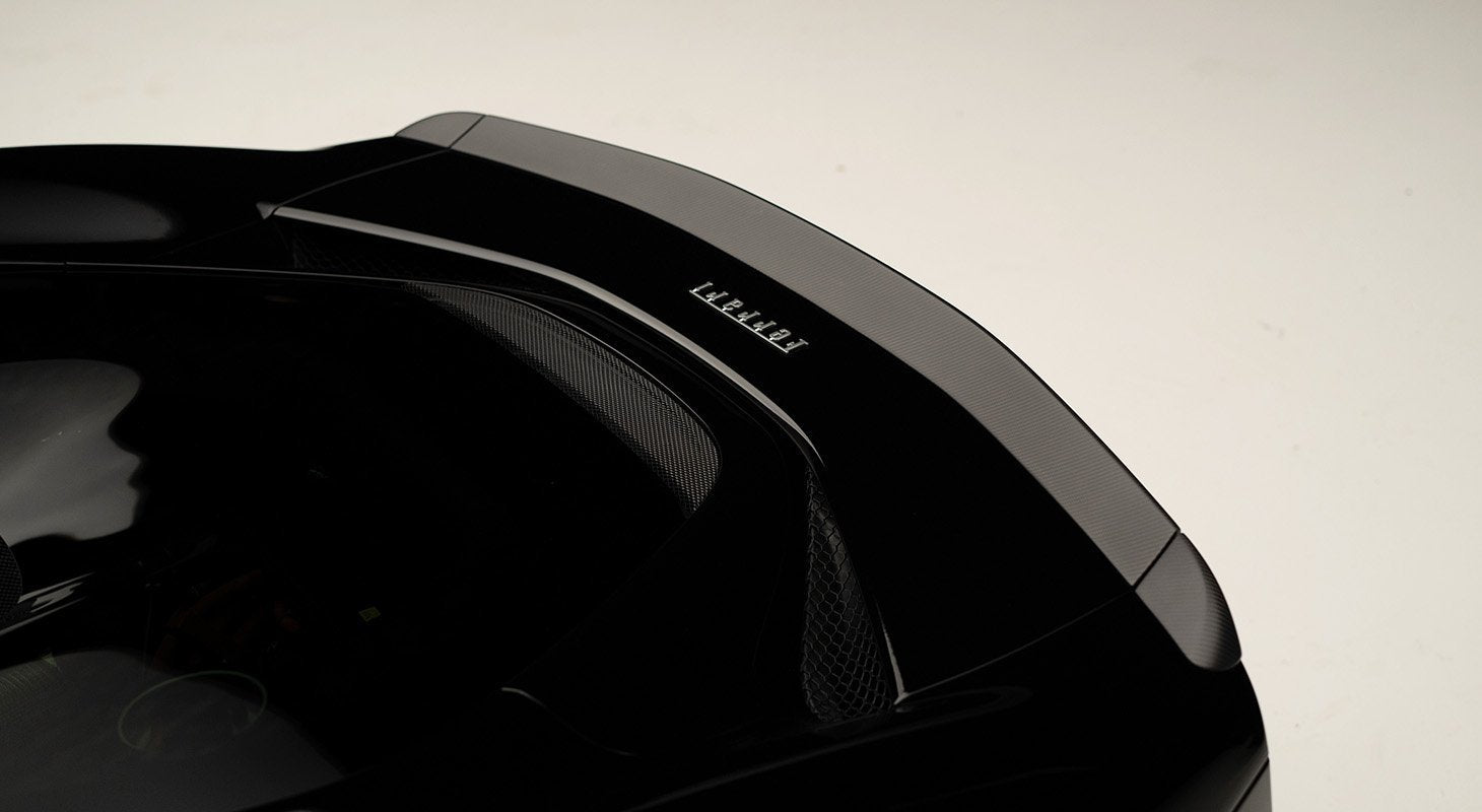 Ferrari 296 rear lip in gloss carbon by Novitec
