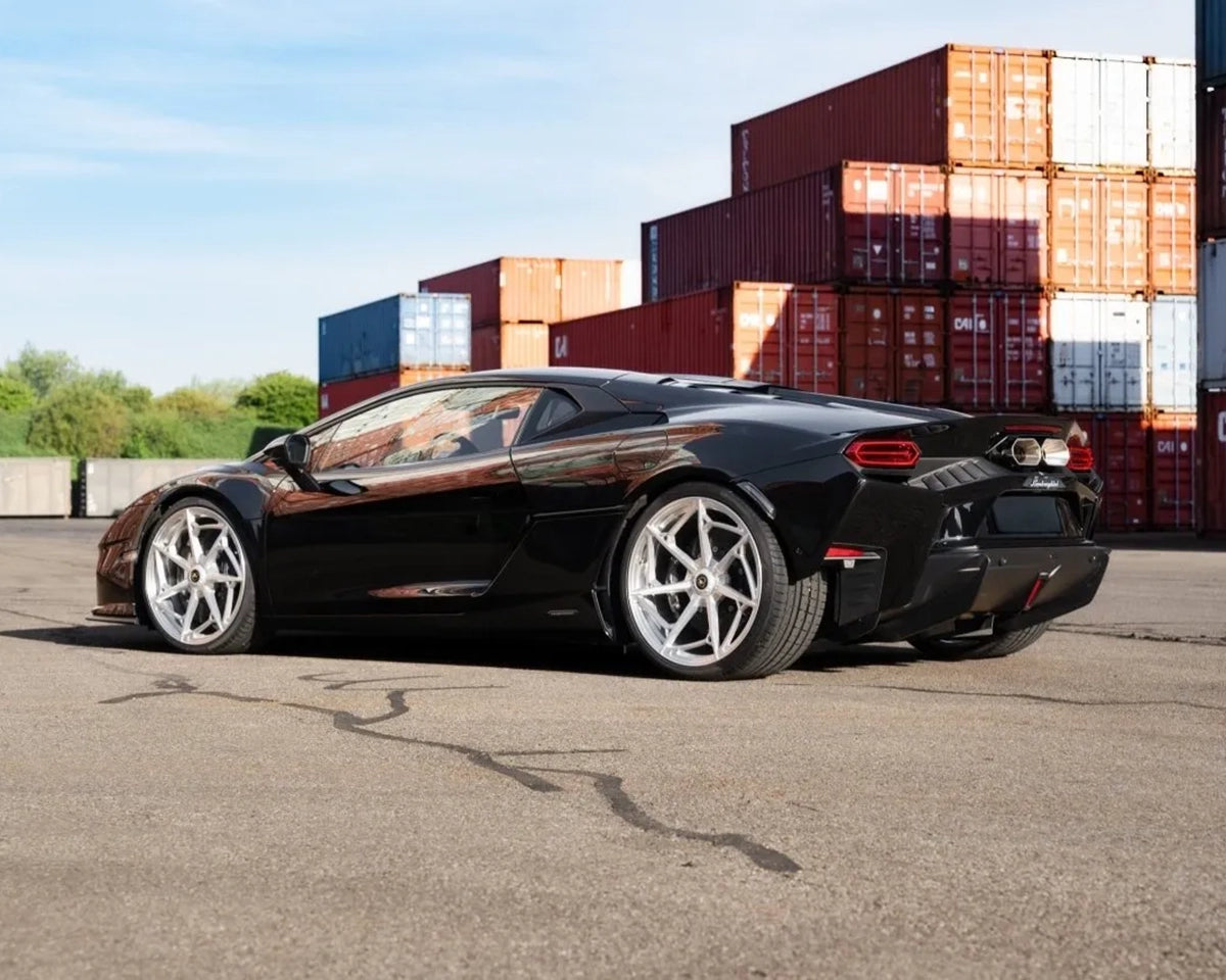 Black Lamborghini Temerario with silver NOVITEC NL7 forged wheels, rear three-quarter view