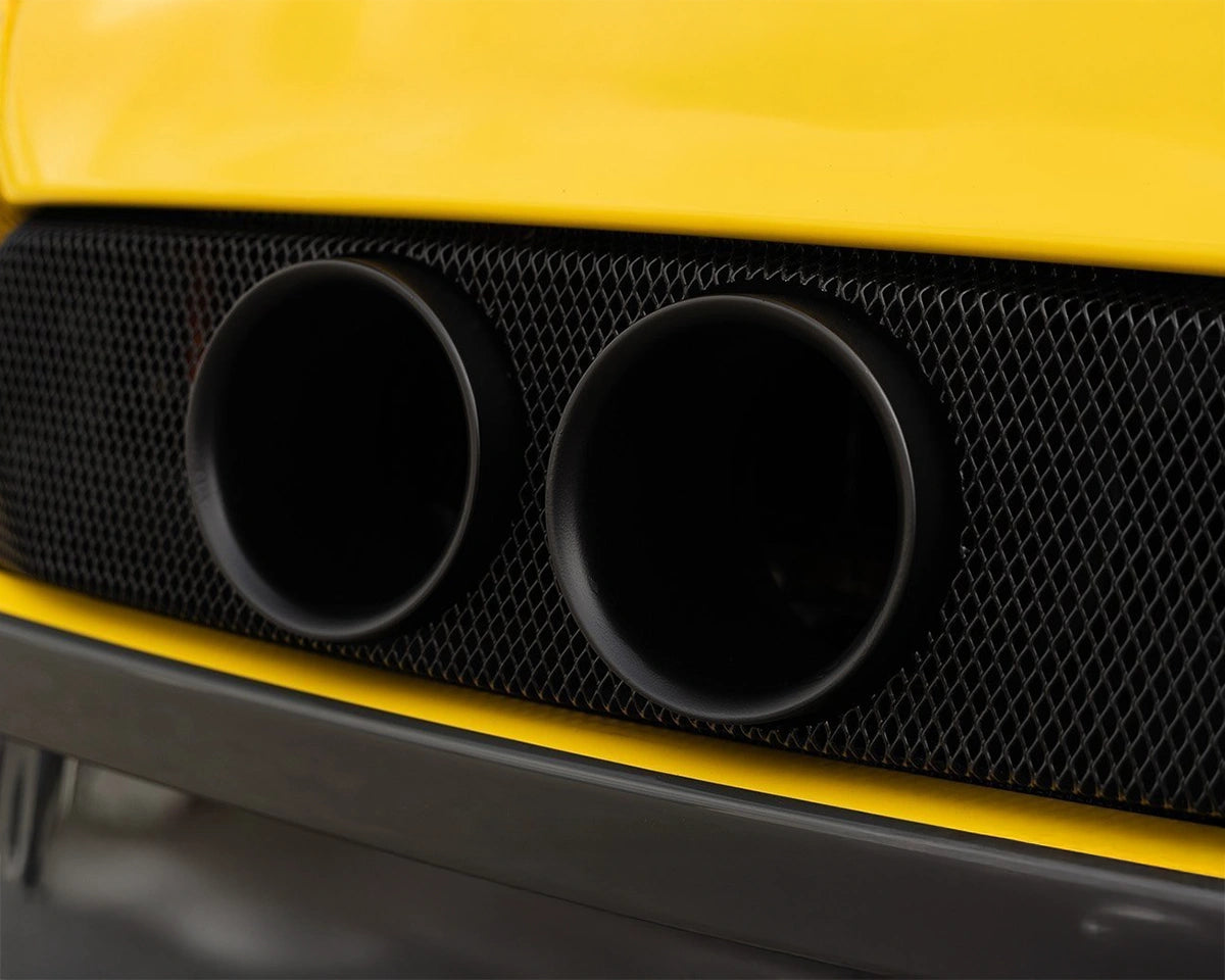 Close-up view of Novitec stainless steel tailpipes for Ferrari 296 GTB and GTS showing material finish